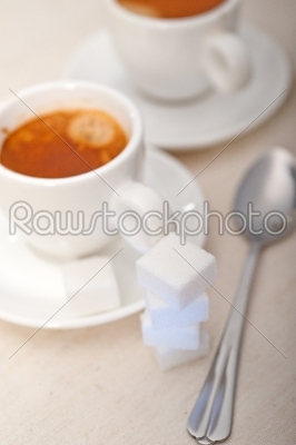 Italian espresso coffee and sugar cubes