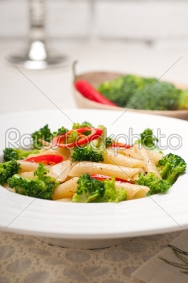 Italian penne pasta with broccoli and chili pepper