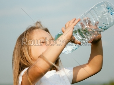 Kid drinking bottled water