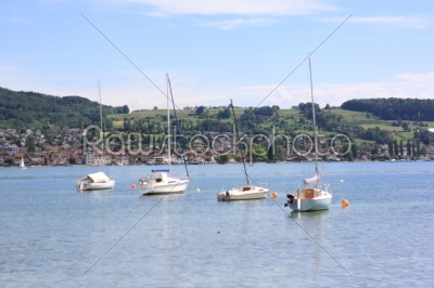 lake with sailing boats