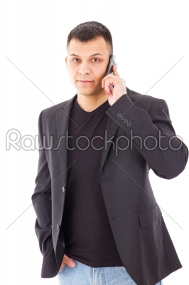 man in a suit talking over mobile
