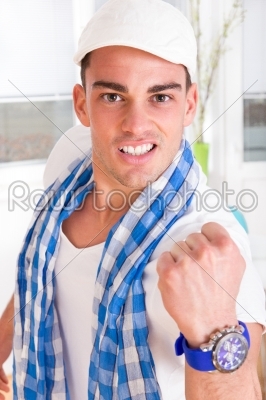 man showing with his hand sign of success