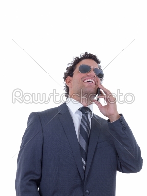 man talking on the phone and laughing