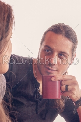 man with a cup of coffee