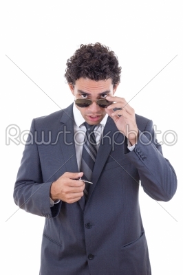 man with glasses holding keys