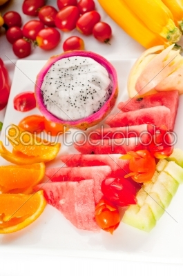 mixed plate of fresh sliced fruits