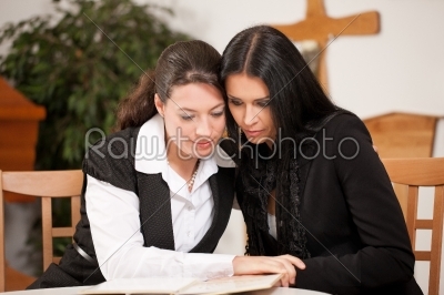 mortician with client comforting and advising