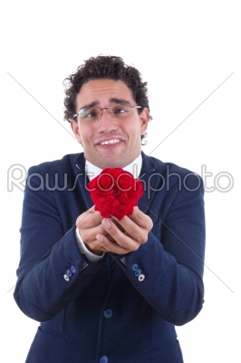 nerd with expression holding flower