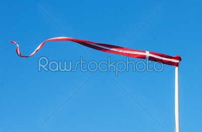 Pennant with the flag of Denmark blowing in the wind
