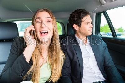 People traveling in taxi, they have an appointment