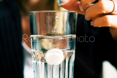 Pill and water