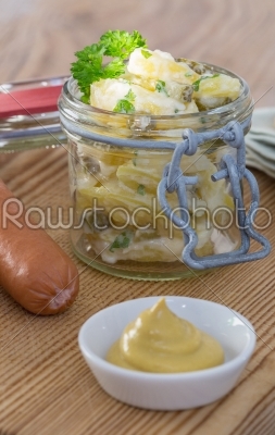 Potato salad with sausage and mustard