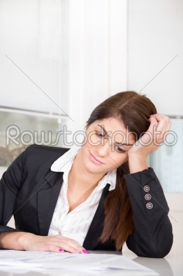 pretty business woman sitting at the table