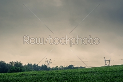 Pylons on a green field