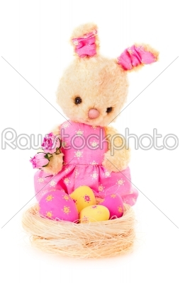 Rabbit bunny toy with flowers and eggs isolated