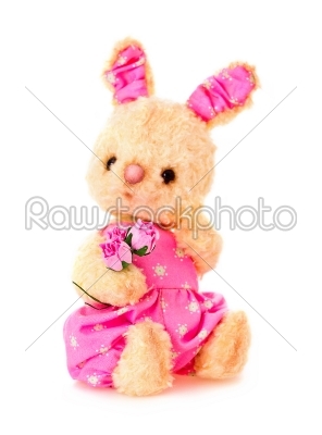 Rabbit bunny toy with flowers isolated in hand