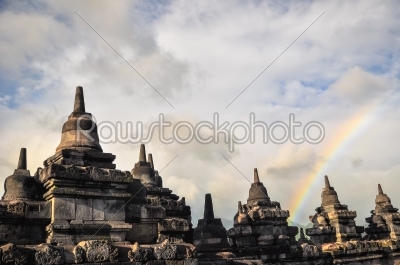 Rainbow over Stupa Buddist temple Borobudur complex in Yogjakart