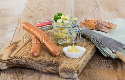 Sausages with mustard and potato salad