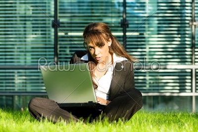 Sitting in the lawn with Laptop