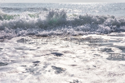 splash of seawater with sea foam and waves