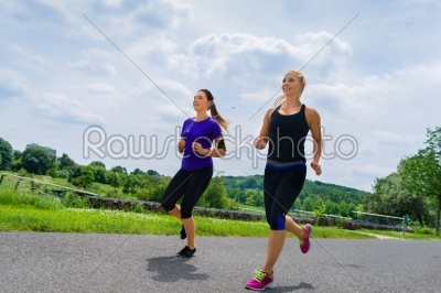 Sports outdoor - young women running in park