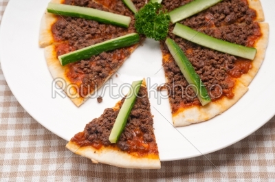 Turkish beef pizza with cucumber on top