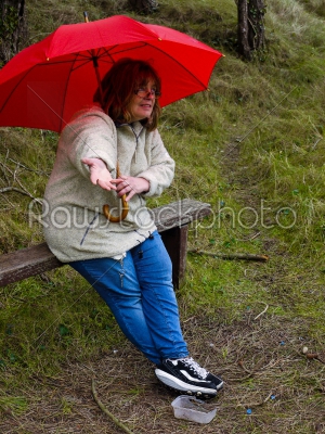 Woman Checking for Rain