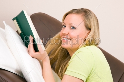 Woman reading on sofa