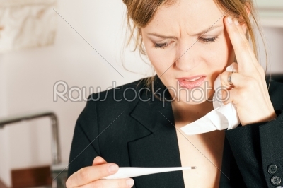 Woman with temperature and flu