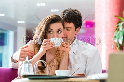Young couple cafe drinking coffee