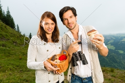 Young mushroom pickers in the Bavarian alps