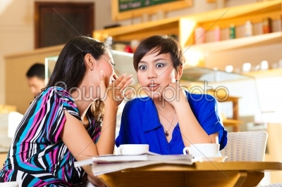 Young women in an Asian coffee shop
