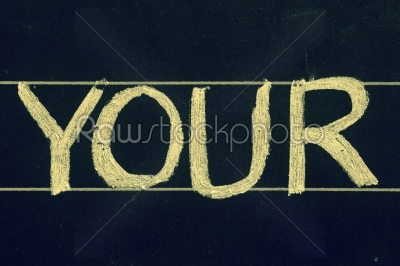 your word handwritten on black chalkboard